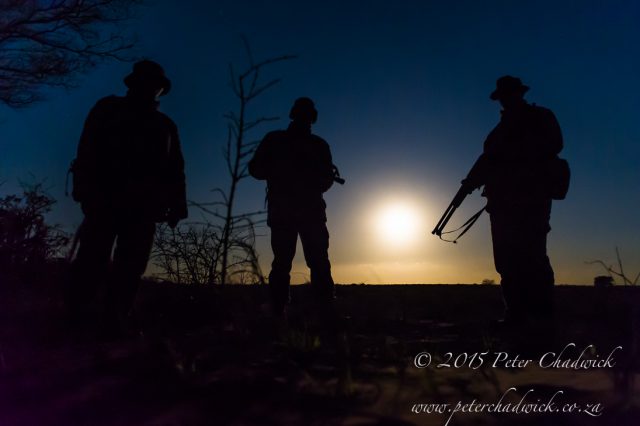 Anti-poaching patrol heading out at full moon, Phinda Private Game Reserve, Zululand, KwaZulu Natal, South Africa